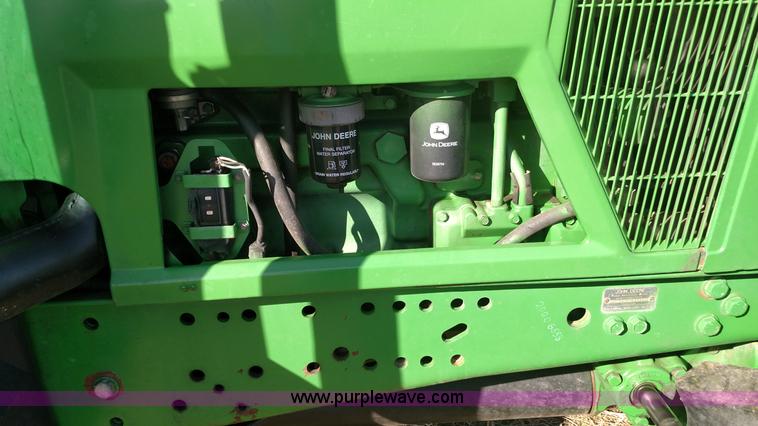 image for item L6088 1999 John Deere 7210 MFWD tractor