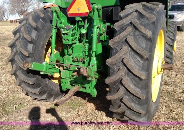 image for item L6088 1999 John Deere 7210 MFWD tractor