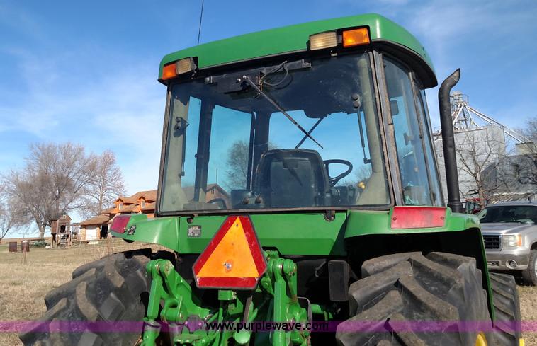 image for item L6088 1999 John Deere 7210 MFWD tractor