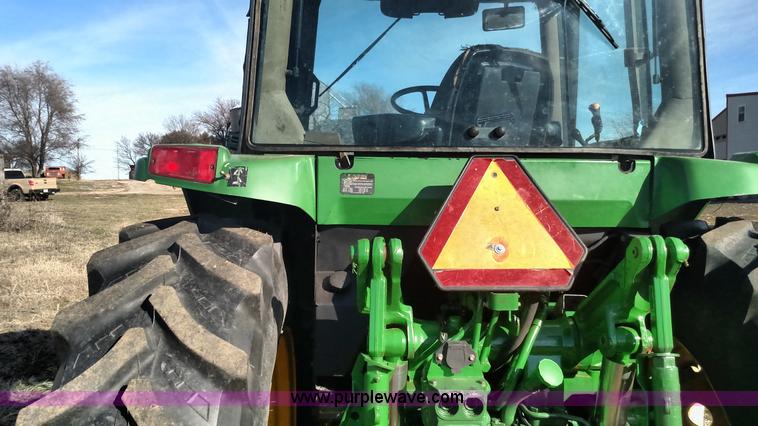 image for item L6088 1999 John Deere 7210 MFWD tractor