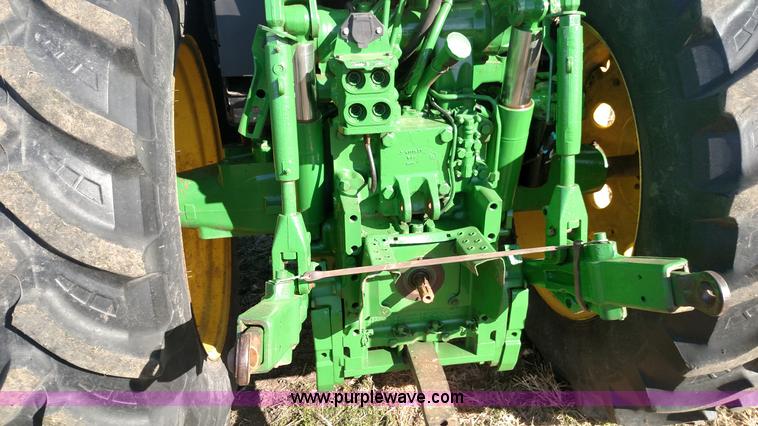 image for item L6088 1999 John Deere 7210 MFWD tractor
