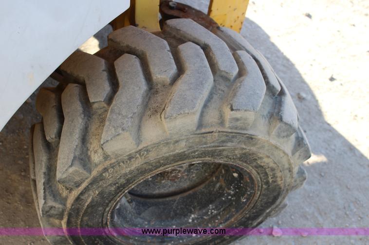 image for item BL9291 2002 Haulotte Compact 3368RT scissor lift