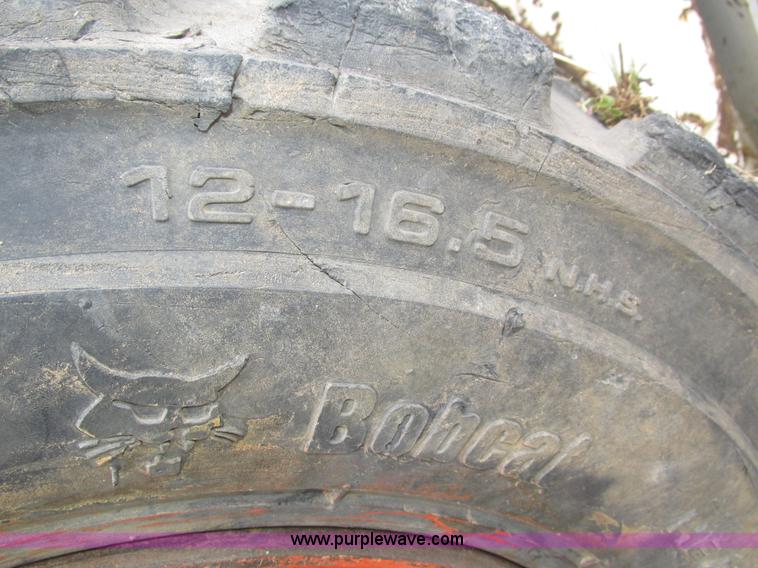 image for item H1005 Bobcat 843 skid steer