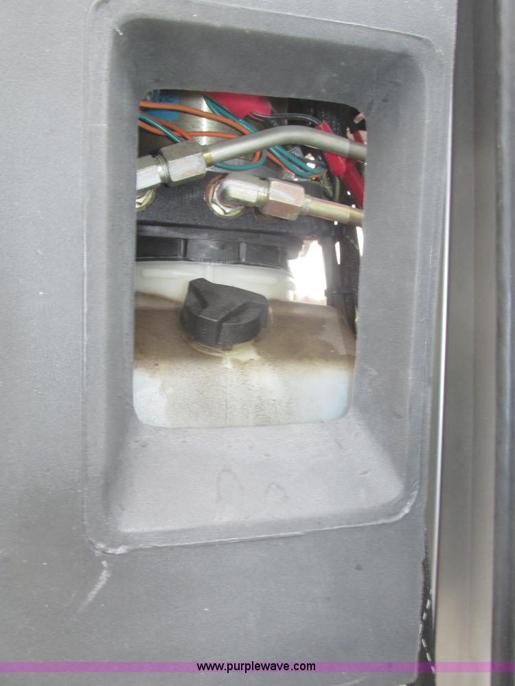 image for item H1011 2004 JLG 12SP vertical lift