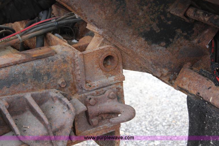 image for item J4564 2002 International 4900 Crew Cab dump truck