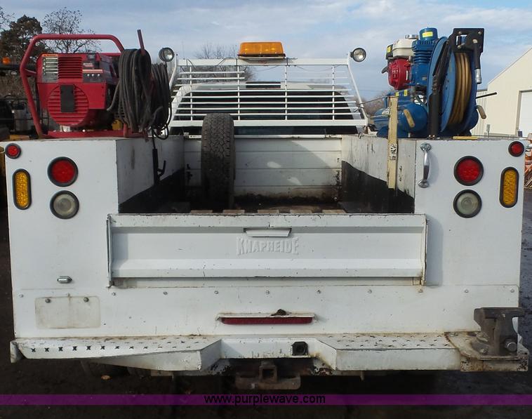 image for item J4750 2005 Ford F350 XL Super Duty Crew Cab utility truck