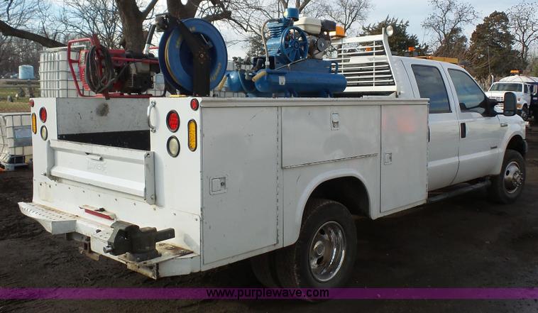 image for item J4750 2005 Ford F350 XL Super Duty Crew Cab utility truck