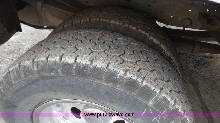 image for item J4750 2005 Ford F350 XL Super Duty Crew Cab utility truck