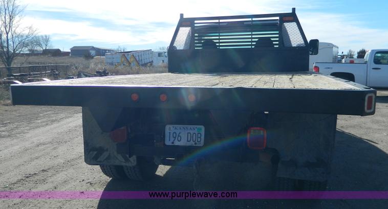 image for item J5151 1994 Ford F450 Super Duty flatbed dump truck