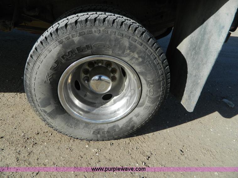 image for item J5151 1994 Ford F450 Super Duty flatbed dump truck