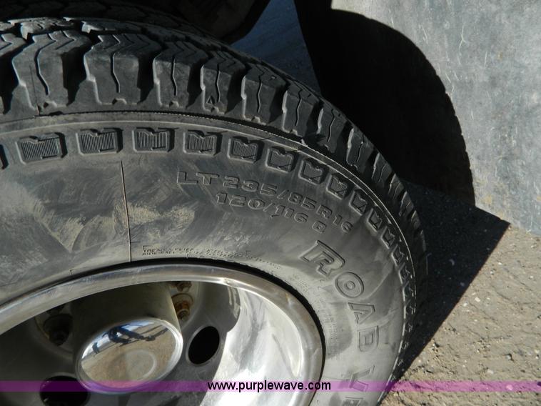 image for item J5151 1994 Ford F450 Super Duty flatbed dump truck