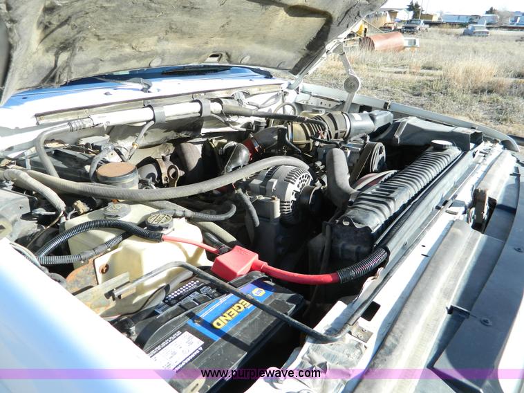 image for item J5151 1994 Ford F450 Super Duty flatbed dump truck