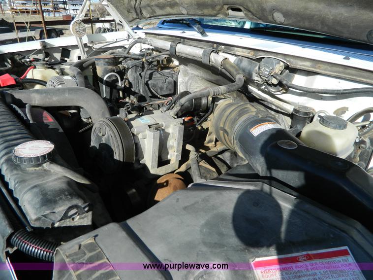 image for item J5151 1994 Ford F450 Super Duty flatbed dump truck