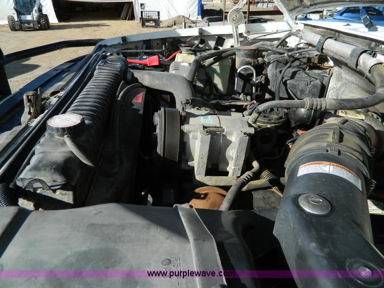 image for item J5151 1994 Ford F450 Super Duty flatbed dump truck