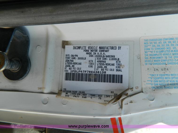 image for item J5151 1994 Ford F450 Super Duty flatbed dump truck