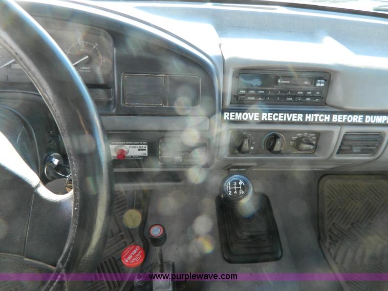 image for item J5151 1994 Ford F450 Super Duty flatbed dump truck