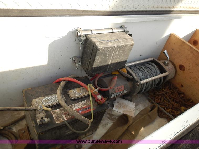 image for item J6323 2011 H&H tilt deck trailer