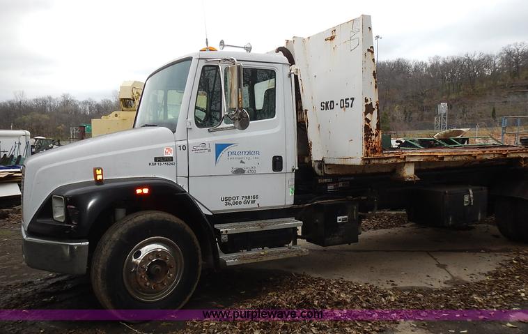 image for item J6341 1997 Freightliner FL70 rollback truck