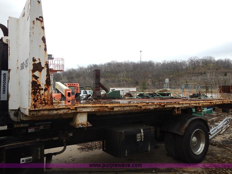 image for item J6341 1997 Freightliner FL70 rollback truck