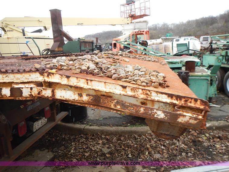 image for item J6341 1997 Freightliner FL70 rollback truck