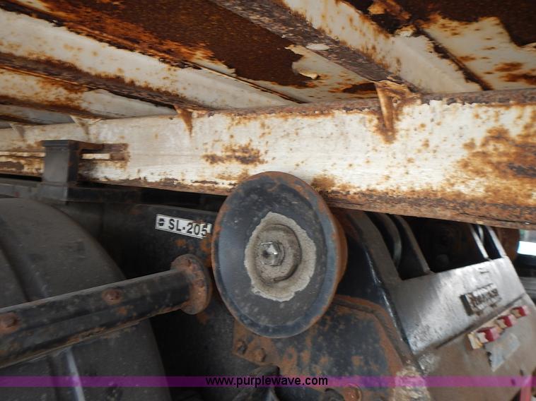 image for item J6341 1997 Freightliner FL70 rollback truck