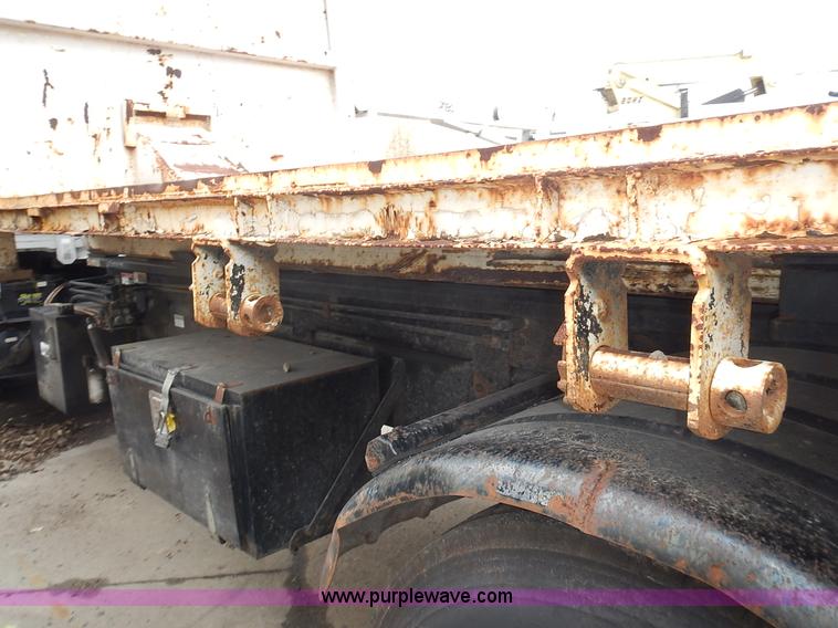 image for item J6341 1997 Freightliner FL70 rollback truck