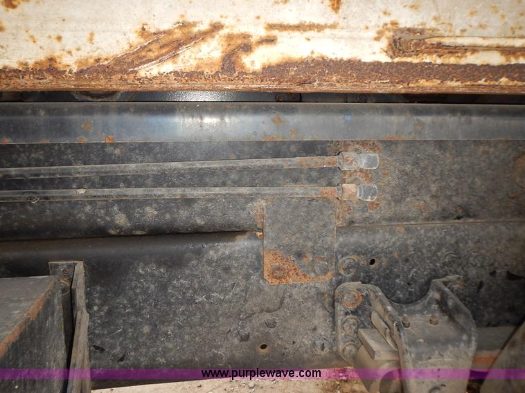 image for item J6341 1997 Freightliner FL70 rollback truck