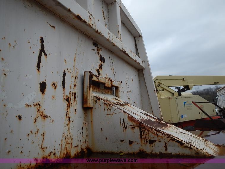 image for item J6341 1997 Freightliner FL70 rollback truck