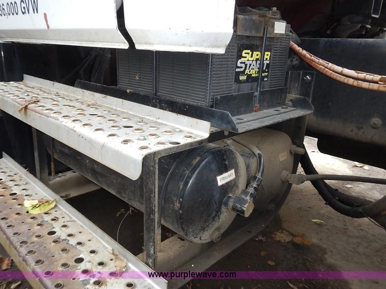 image for item J6341 1997 Freightliner FL70 rollback truck