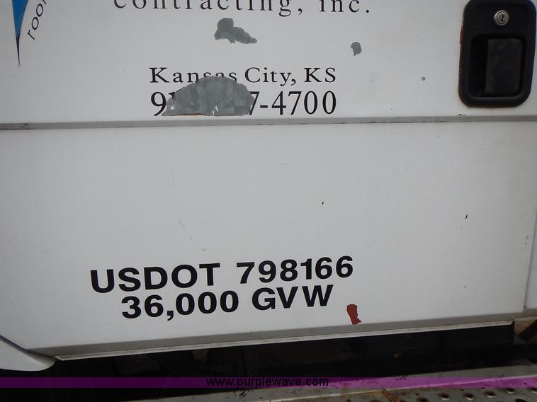 image for item J6341 1997 Freightliner FL70 rollback truck