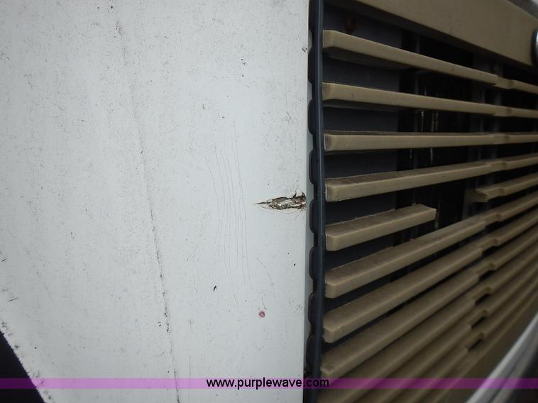 image for item J6341 1997 Freightliner FL70 rollback truck