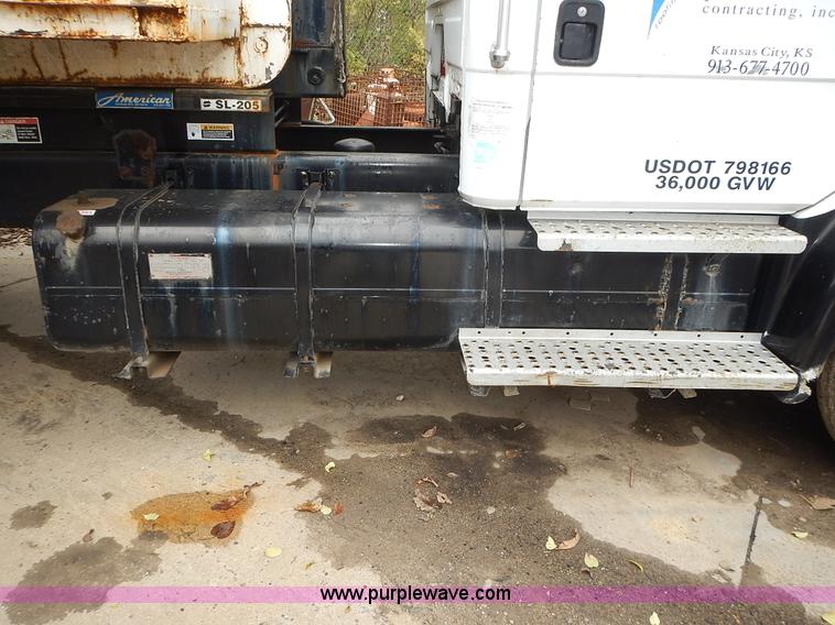 image for item J6341 1997 Freightliner FL70 rollback truck