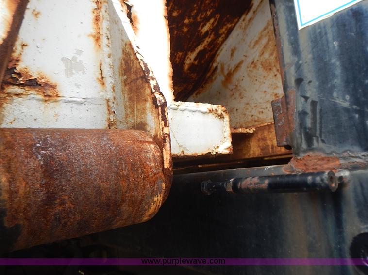 image for item J6341 1997 Freightliner FL70 rollback truck