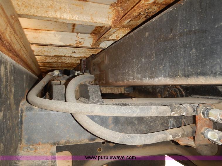 image for item J6341 1997 Freightliner FL70 rollback truck