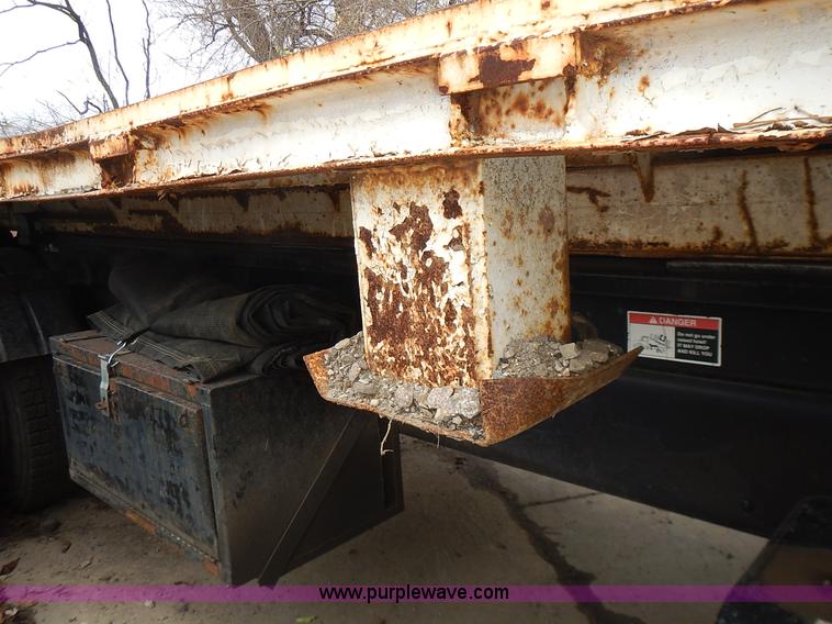 image for item J6341 1997 Freightliner FL70 rollback truck