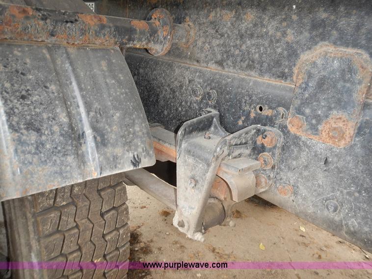 image for item J6341 1997 Freightliner FL70 rollback truck