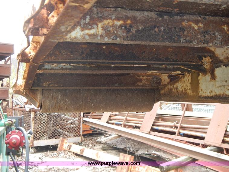 image for item J6341 1997 Freightliner FL70 rollback truck