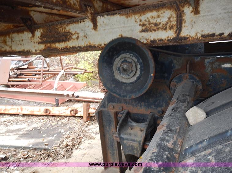 image for item J6341 1997 Freightliner FL70 rollback truck