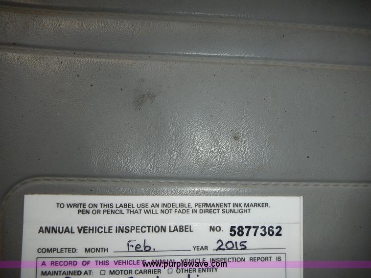 image for item J6341 1997 Freightliner FL70 rollback truck