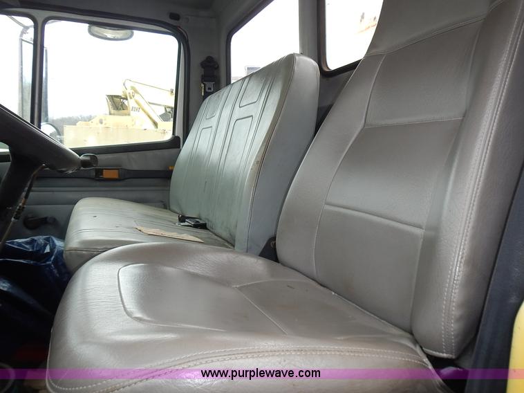 image for item J6341 1997 Freightliner FL70 rollback truck