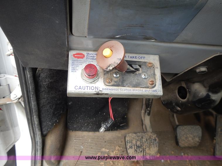 image for item J6341 1997 Freightliner FL70 rollback truck