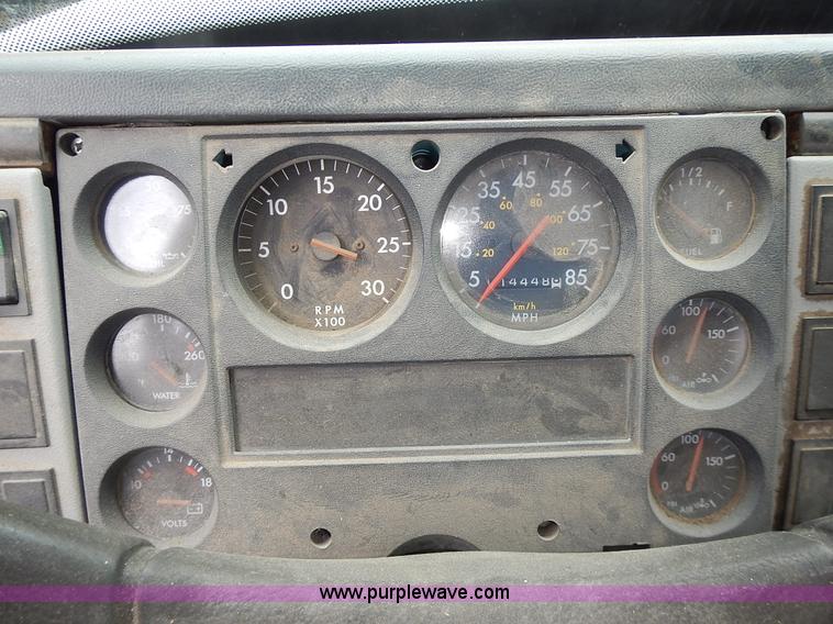 image for item J6341 1997 Freightliner FL70 rollback truck