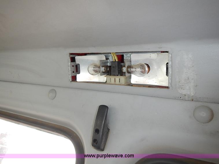 image for item J6341 1997 Freightliner FL70 rollback truck