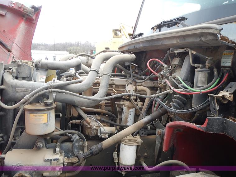 image for item J6341 1997 Freightliner FL70 rollback truck