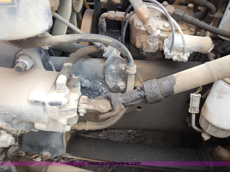 image for item J6341 1997 Freightliner FL70 rollback truck