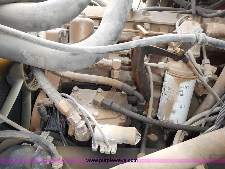 image for item J6341 1997 Freightliner FL70 rollback truck