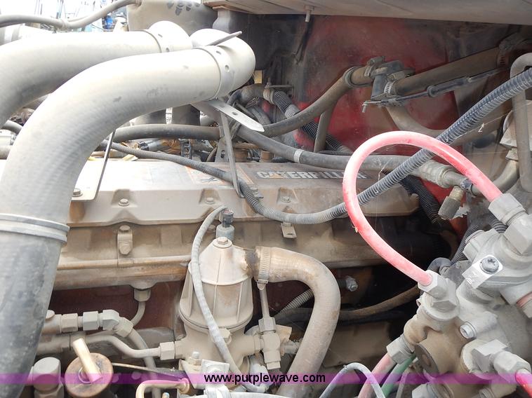 image for item J6341 1997 Freightliner FL70 rollback truck