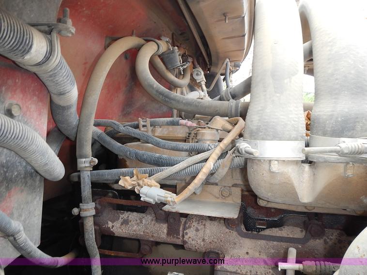 image for item J6341 1997 Freightliner FL70 rollback truck