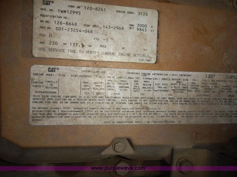 image for item J6341 1997 Freightliner FL70 rollback truck