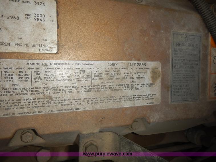 image for item J6341 1997 Freightliner FL70 rollback truck